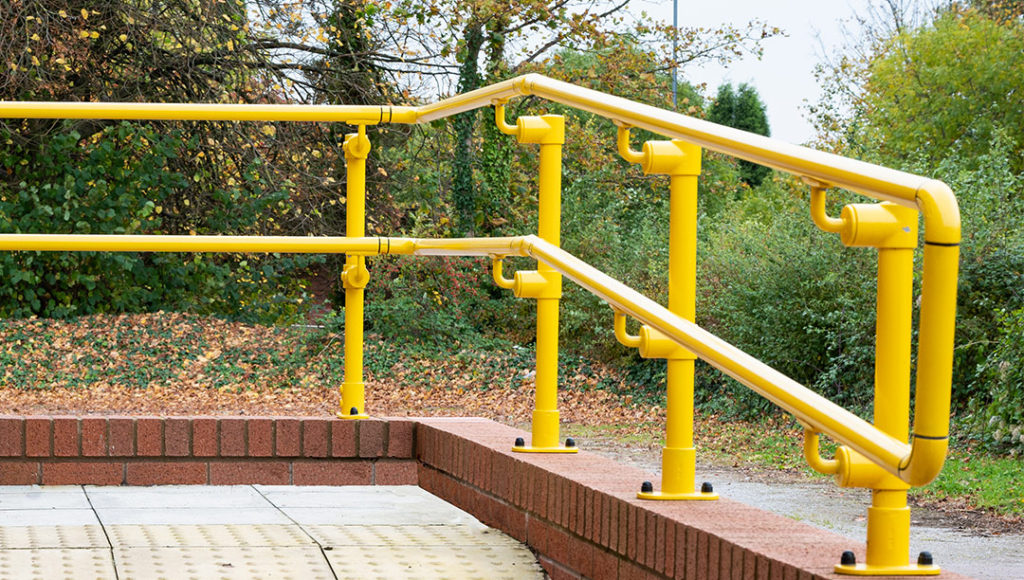 Yellow powder coated Key Clamp handrails.